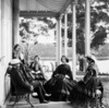William Wright and friends at Drummoyne Park. Group on verandah.